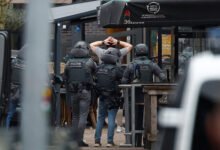 The final hostage is freed when Dutch police apprehend a man leaving a nightclub